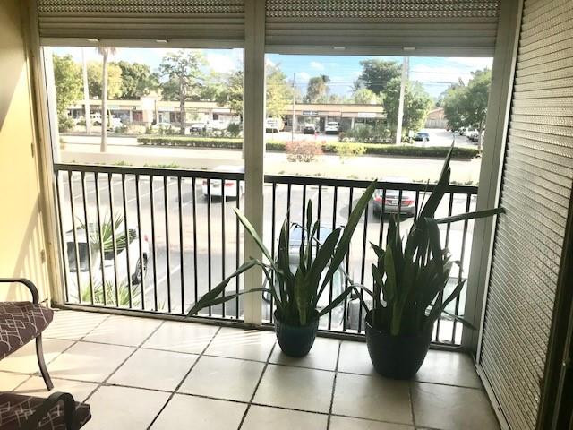 257 South Cypress Road, Unit 423 Pompano Beach, FL 33060 - Photo 23 of 38 a view of a balcony with potted plants