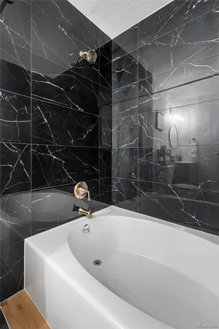 a bathroom with a bathtub
