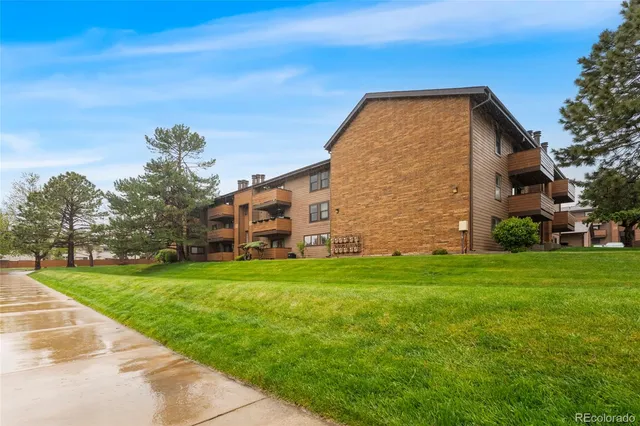 a view of a house with a big yard