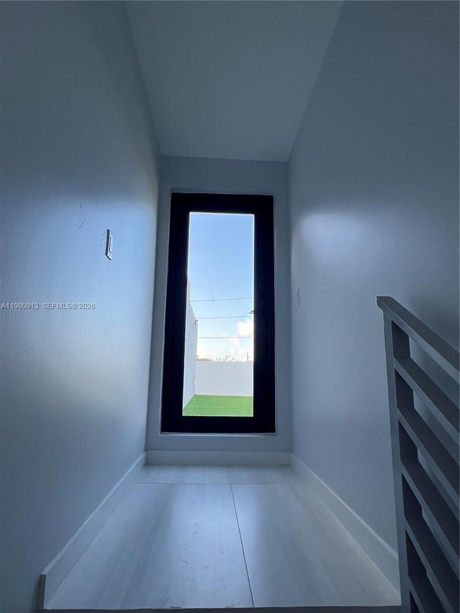 1533 Southwest 22nd Terrace Miami, FL 33145 - Photo 15 of 28 a view of an empty room with a window
