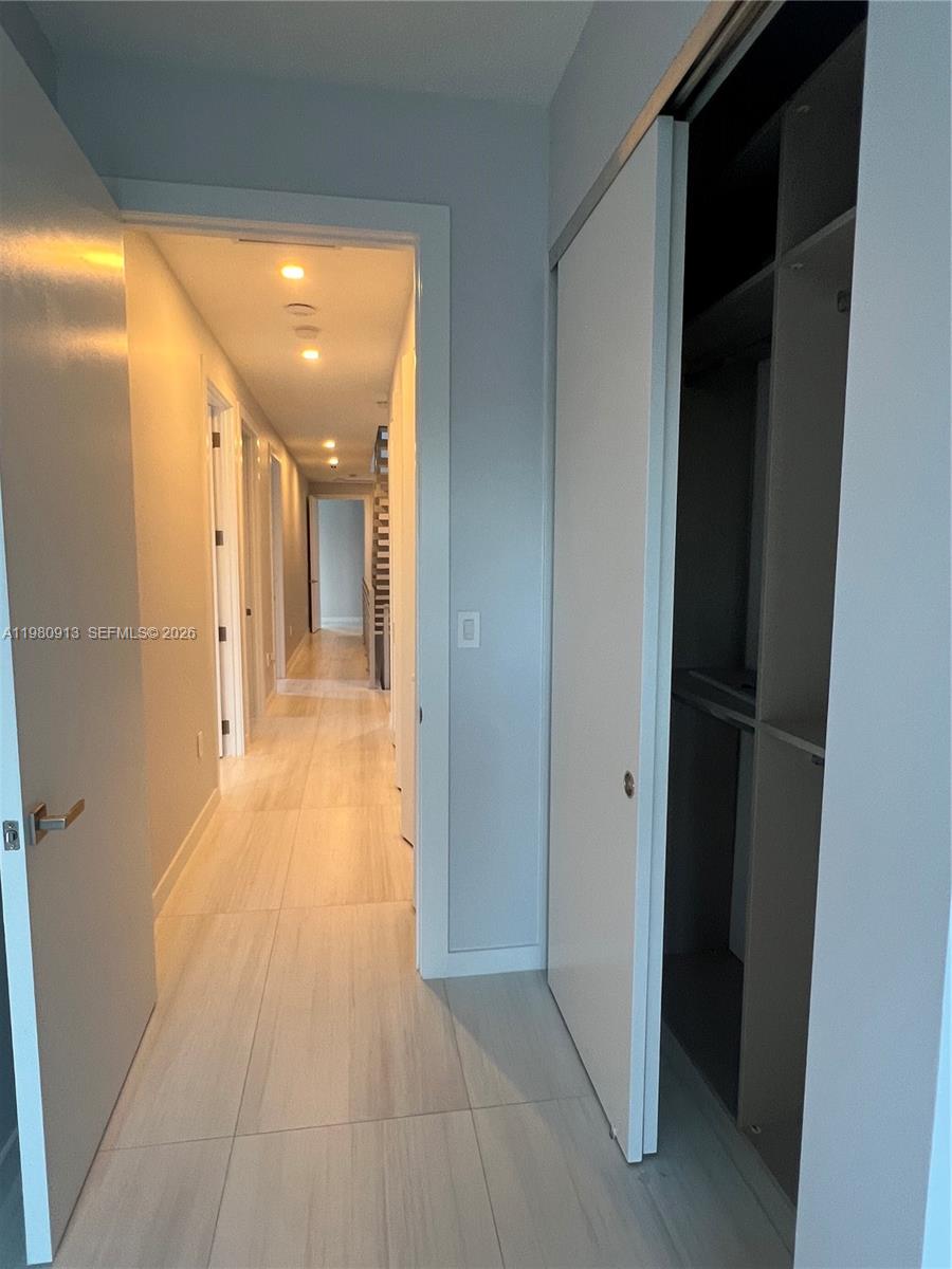 1533 Southwest 22nd Terrace Miami, FL 33145 - Photo 23 of 28 a view of a hallway with wooden floor