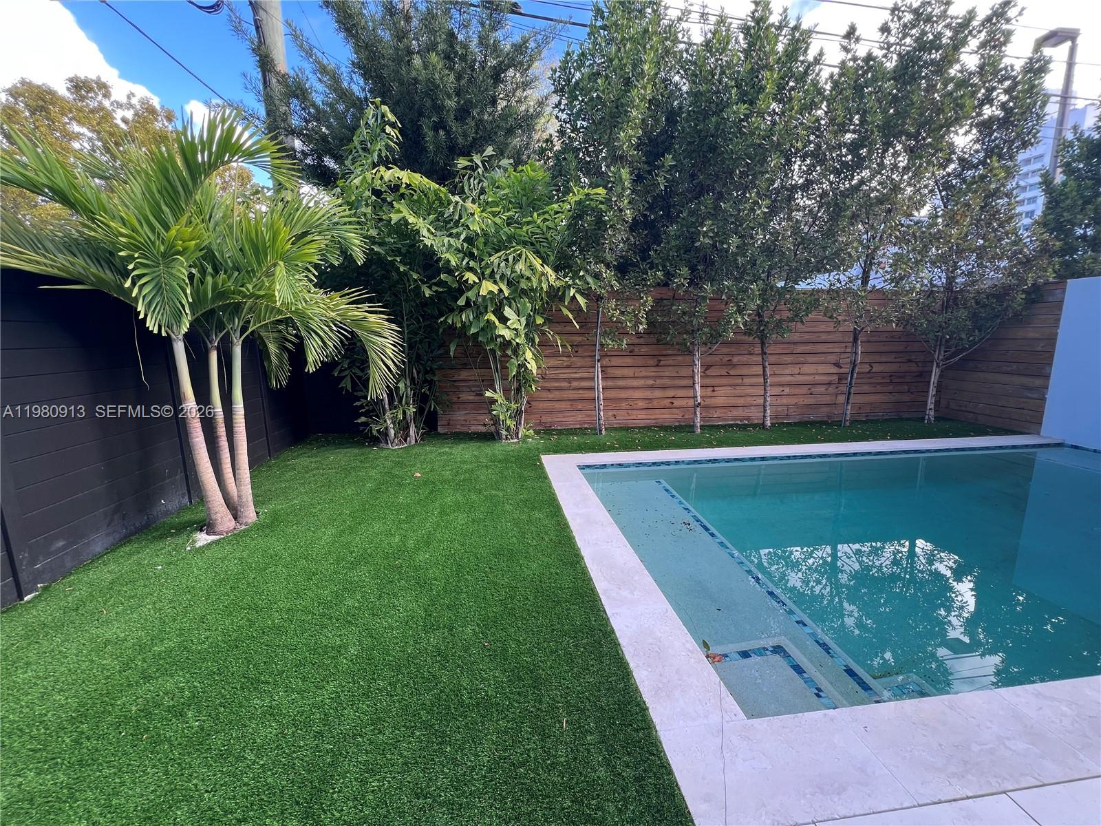 1533 Southwest 22nd Terrace Miami, FL 33145 - Photo 9 of 28 a view of a backyard with a garden