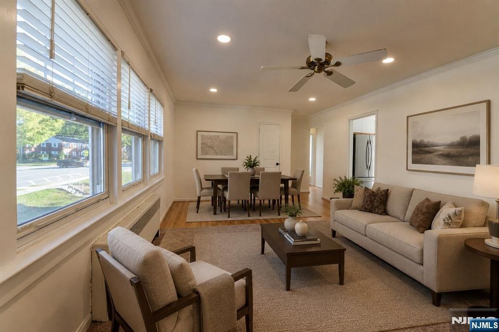 255 Bogert Road, Unit 2A River Edge, NJ 07661 - Photo 4 of 23 a living room with furniture and a large window