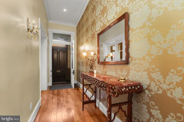 a view of a livingroom with furniture and wooden floor