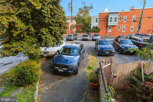 a car parked in front of a building