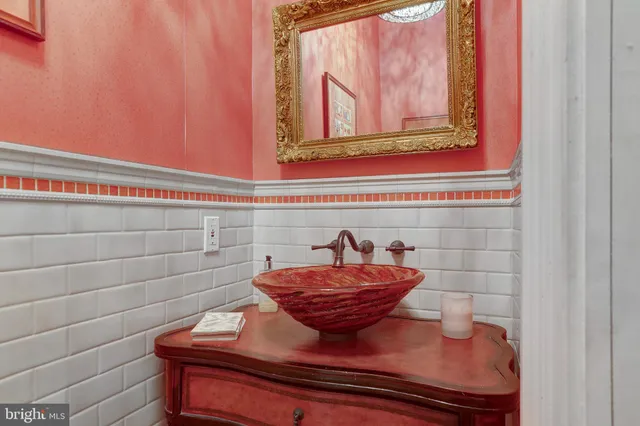 a view of sink sitting in a bathroom