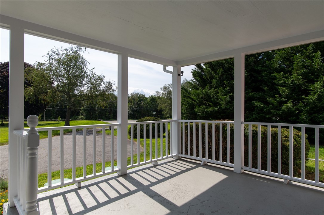 348 West Main Road Portsmouth, RI 02871 - Photo 3 of 26 covered porch looking down driveway to W. Main rd