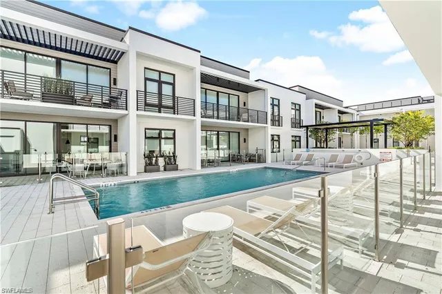 a view of a house with swimming pool