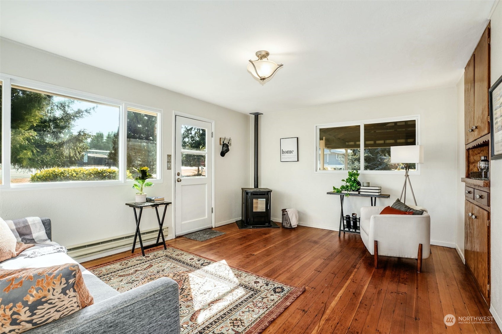 14520 Renton Issaquah Road Southeast Renton, WA 98059 - Photo 6 of 34 a living room with furniture and a wooden floor