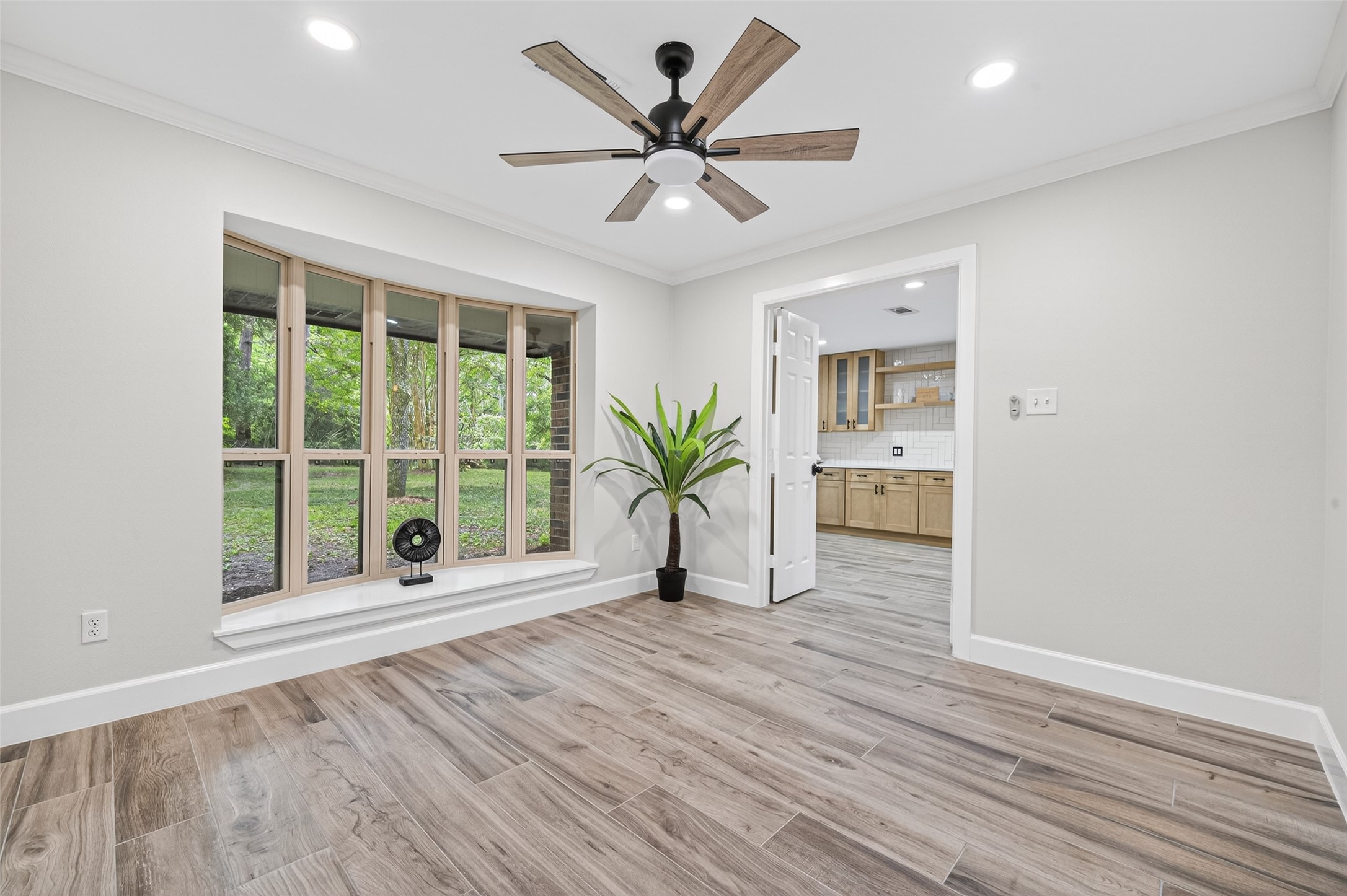 23607 Cardinal Drive Hockley, TX 77447 - Photo 6 of 50 This flexible waiting room features crown molding and an oversized bay window seat, offering a serene spot for morning coffee or a quiet secondary lounge.