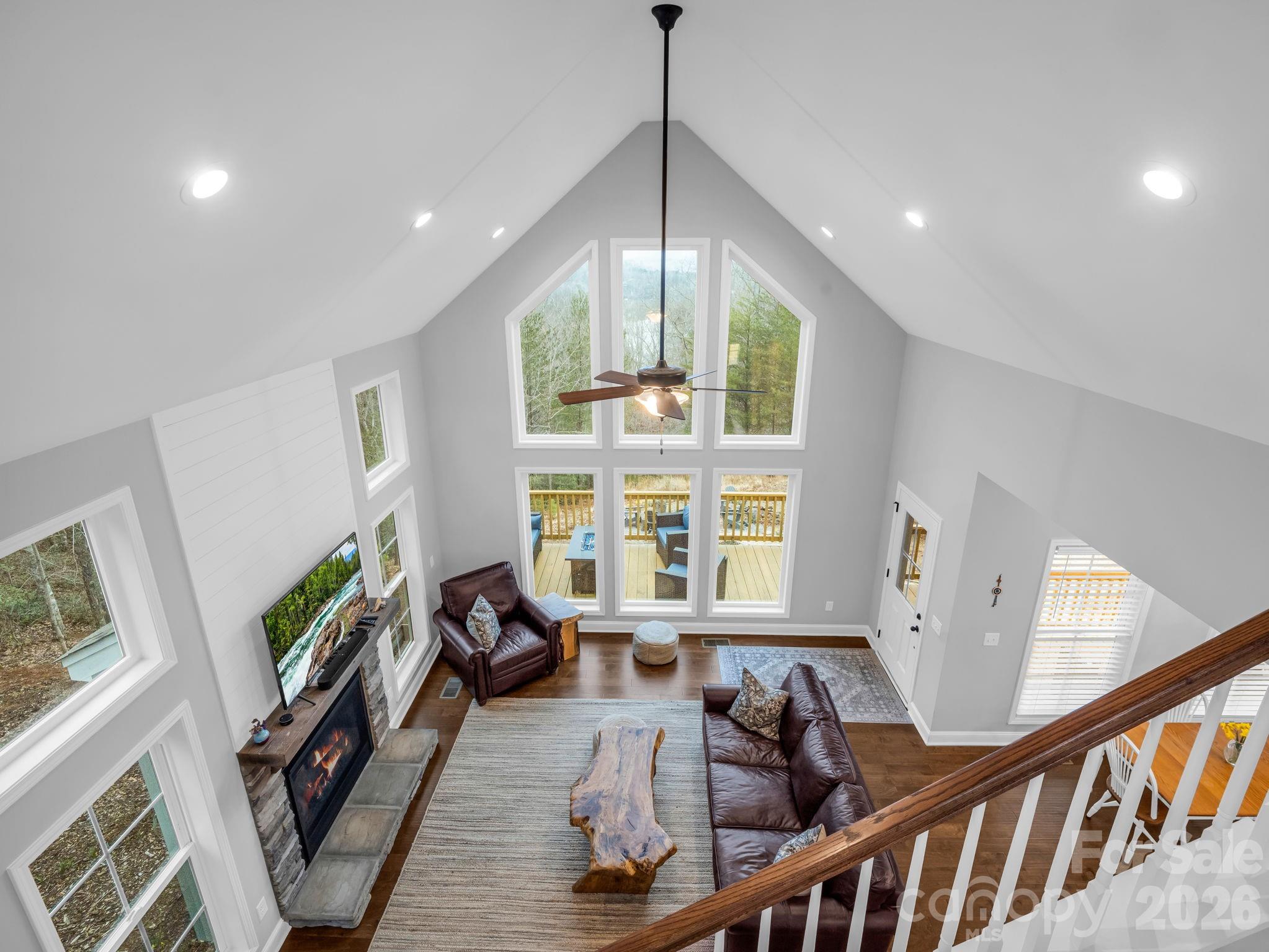 631 Mountain Parkway Mill Spring, NC 28756 - Photo 22 of 43 a very nice looking living room with furniture and a large window