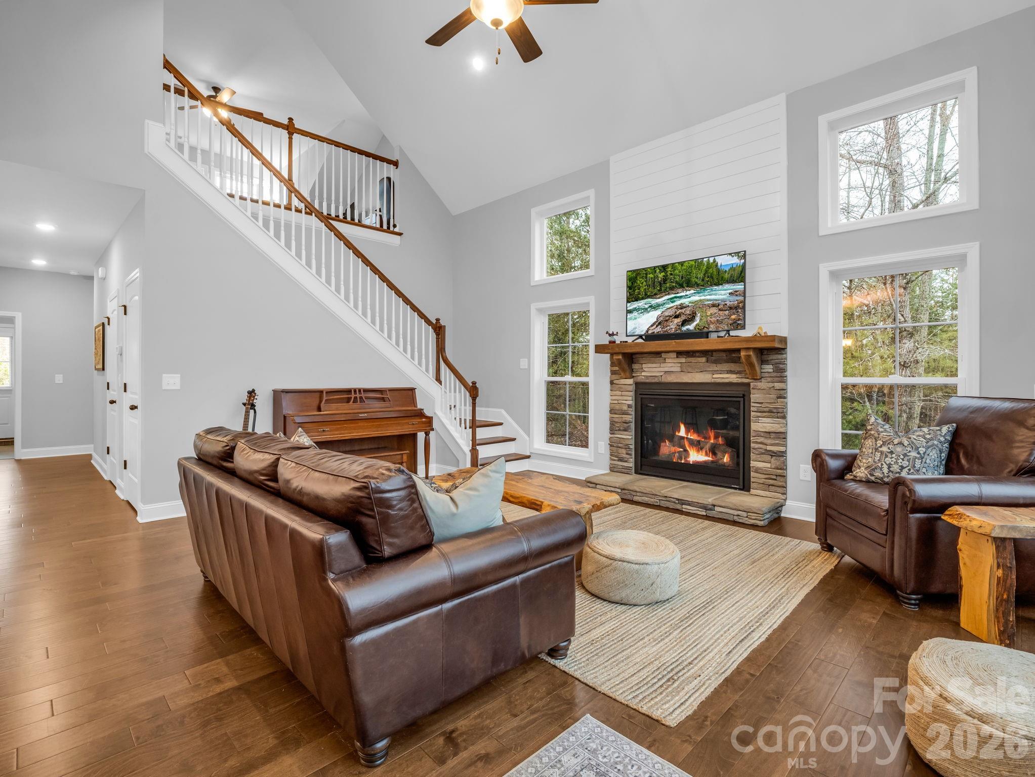 631 Mountain Parkway Mill Spring, NC 28756 - Photo 8 of 43 a living room with furniture and a fireplace