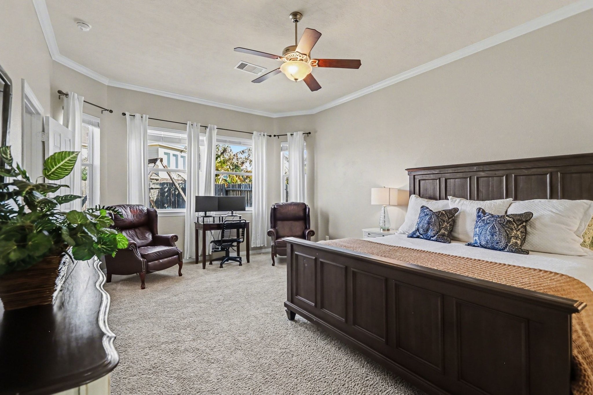 27006 Cliff Pointe Lane Katy, TX 77494 - Photo 20 of 34 Thoughtfully designed primary suite with space for a sitting area or home office, creating a relaxing, retreat-like feel.
