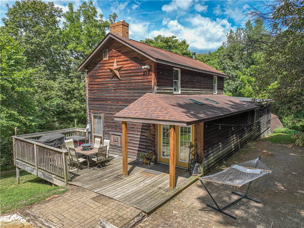 130 Alpine Smock, PA 15480 - Photo 1 of 41 a view of a house with a yard and furniture