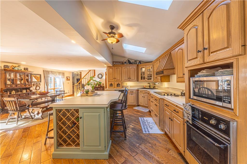 130 Alpine Smock, PA 15480 - Photo 13 of 41 a kitchen with stainless steel appliances granite countertop a stove and cabinets
