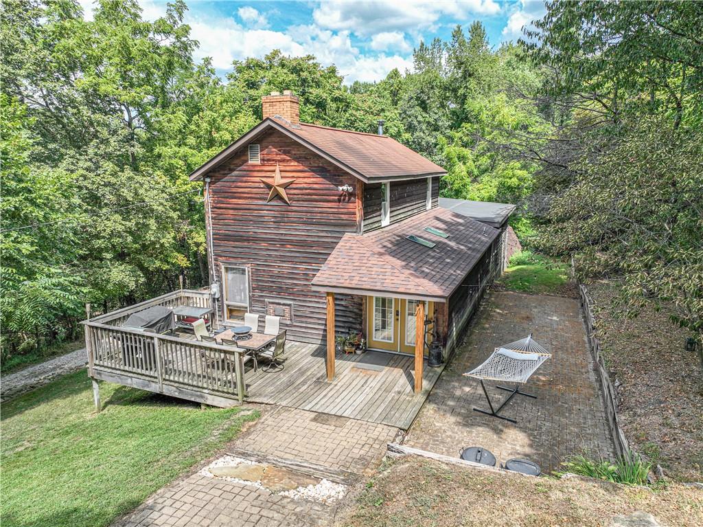 130 Alpine Smock, PA 15480 - Photo 35 of 41 a house with a bench in front of it