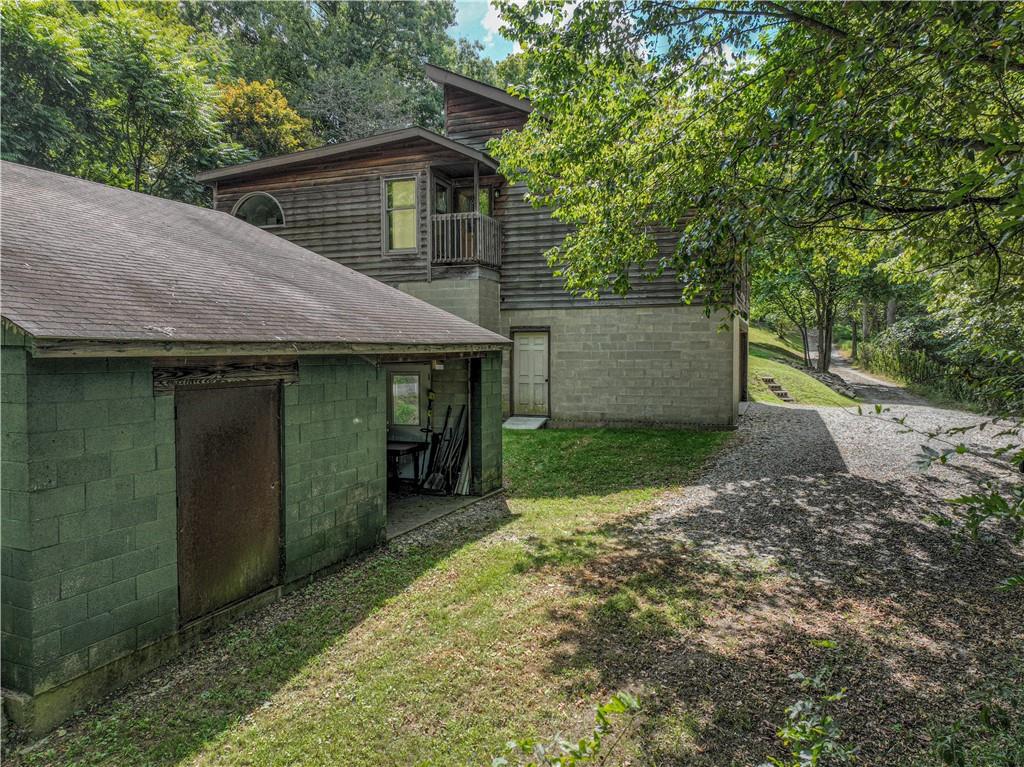 130 Alpine Smock, PA 15480 - Photo 40 of 41 a front view of a house with a garden