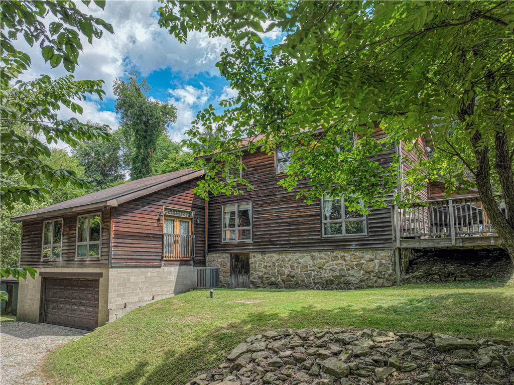 130 Alpine Smock, PA 15480 - Photo 41 of 41 a front view of a house with a garden