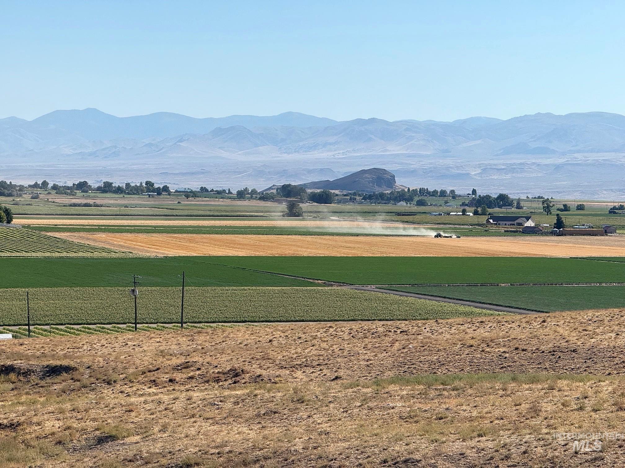 Tbd Tbd Can Ada Melba, ID 83641 - Photo 2 of 5 Surrounding community featuring agricultural area, a mountain view, and a rural view