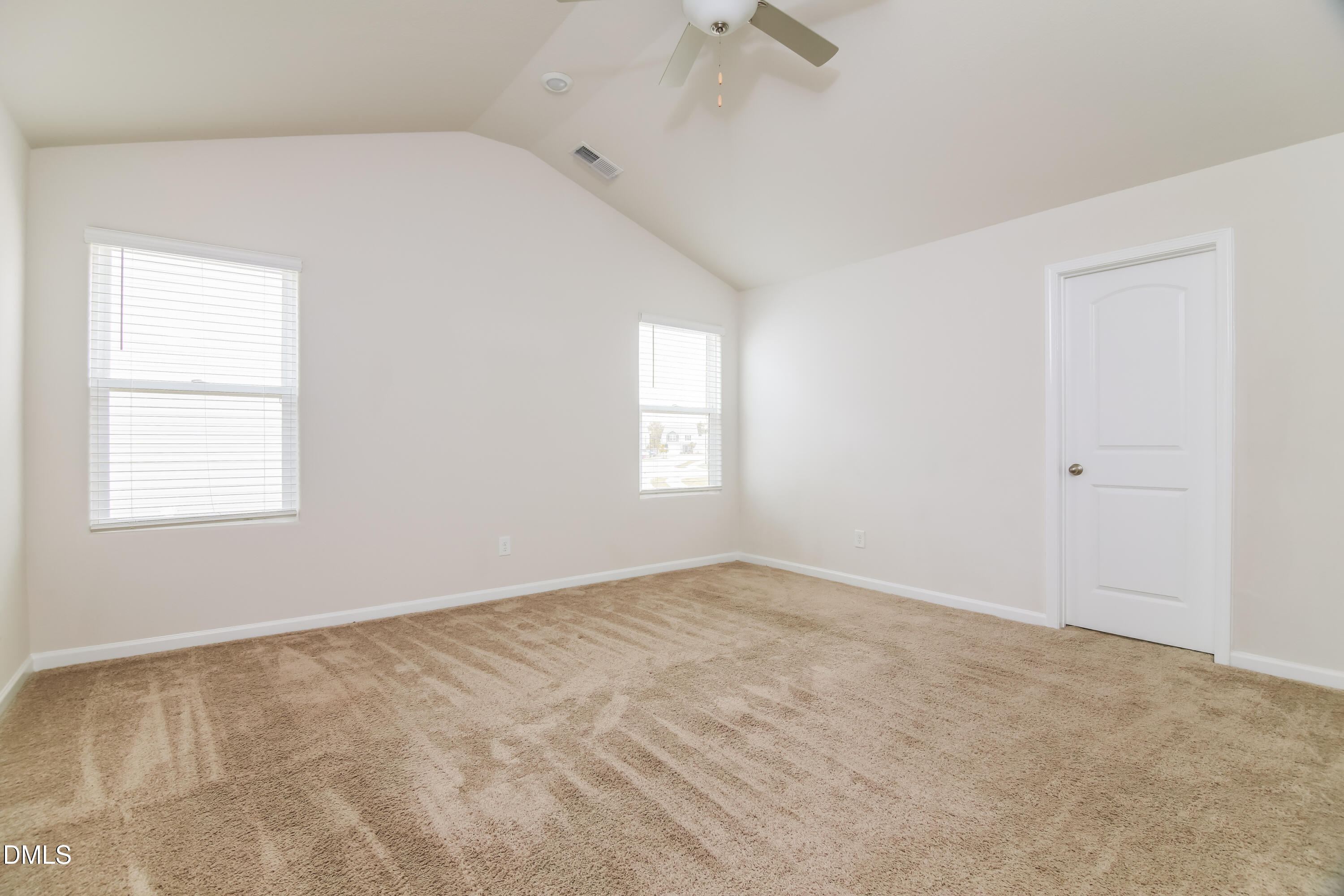 336 Gourd Street Zebulon, NC 27597 - Photo 8 of 17 an empty room with a window
