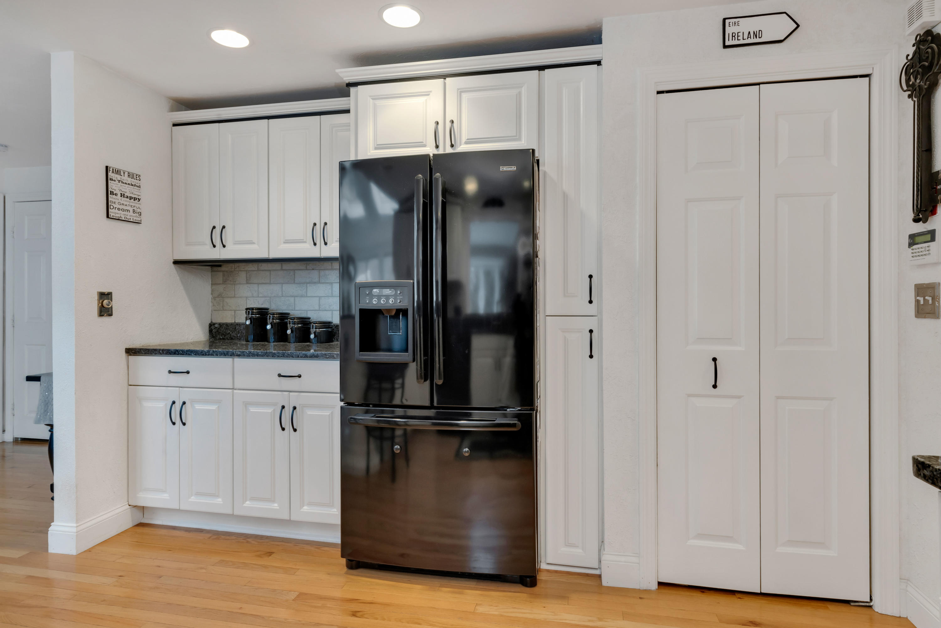 48 Square Rigger Lane Hyannis, MA 02601 - Photo 15 of 36 a kitchen with a refrigerator a stove and white cabinets