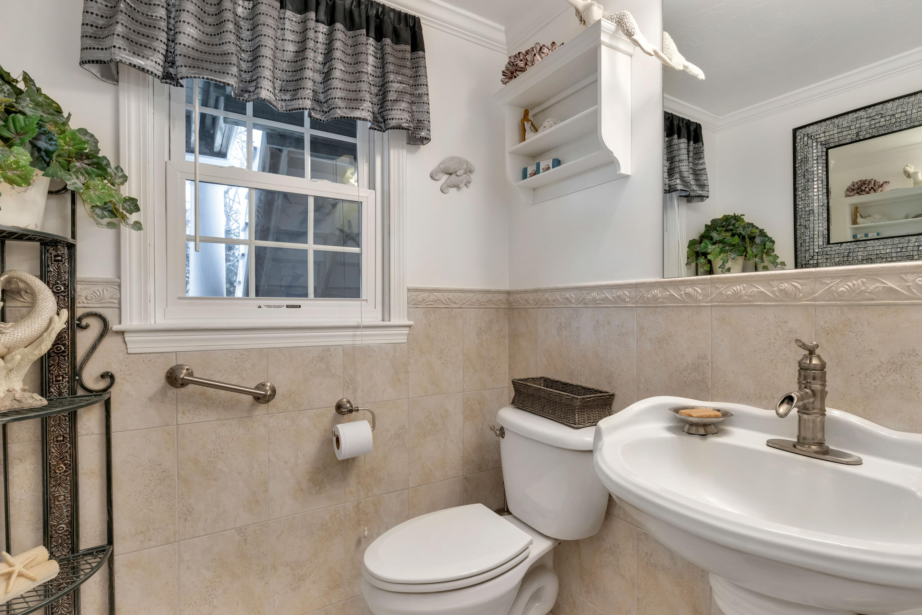 48 Square Rigger Lane Hyannis, MA 02601 - Photo 17 of 36 a white toilet sitting next to a bathroom sink