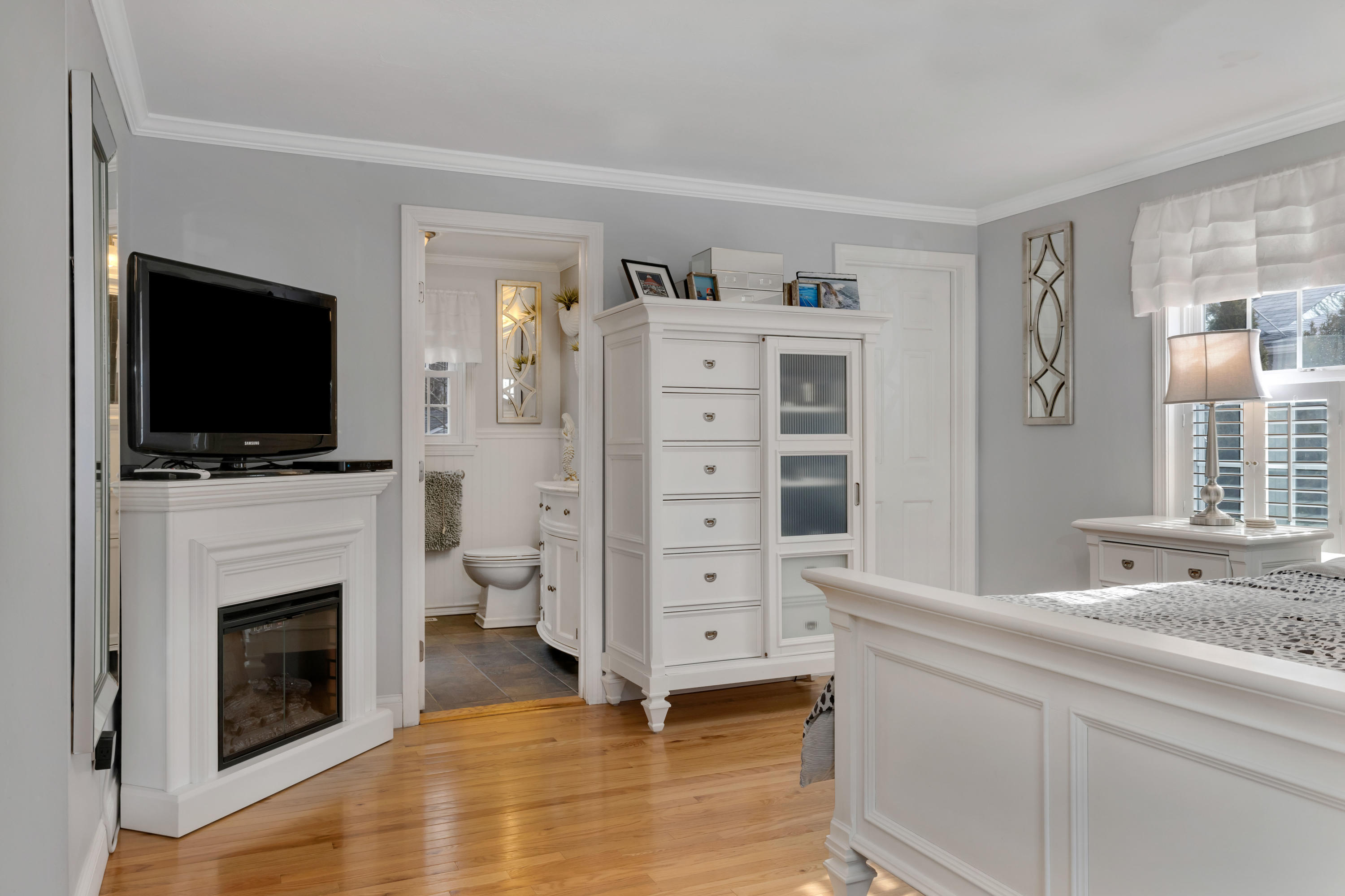 48 Square Rigger Lane Hyannis, MA 02601 - Photo 19 of 36 a living room with furniture and a flat screen tv