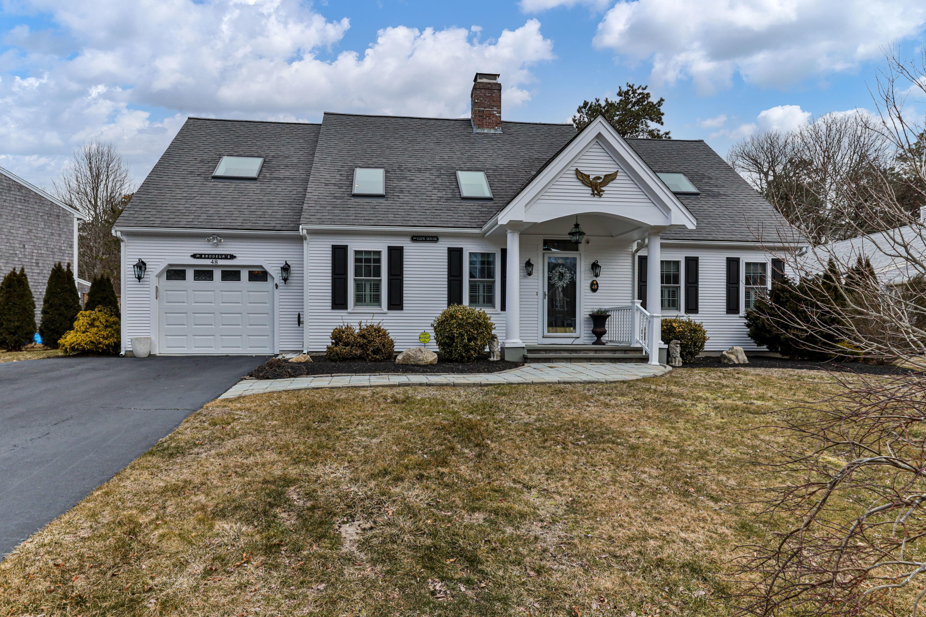 48 Square Rigger Lane Hyannis, MA 02601 - Photo 2 of 36 a front view of a house with garden