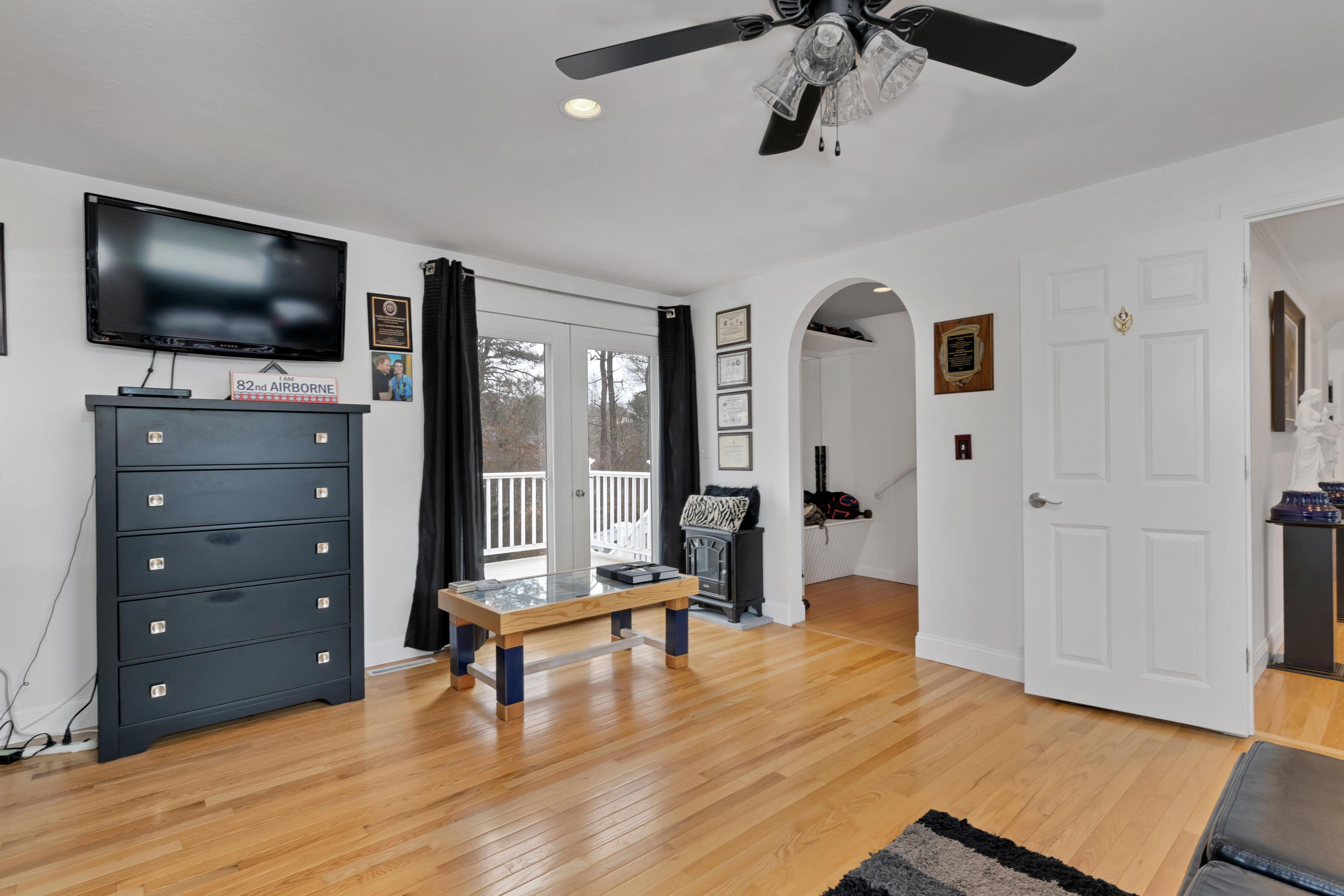 48 Square Rigger Lane Hyannis, MA 02601 - Photo 25 of 36 a view of a livingroom with furniture and a flat screen tv