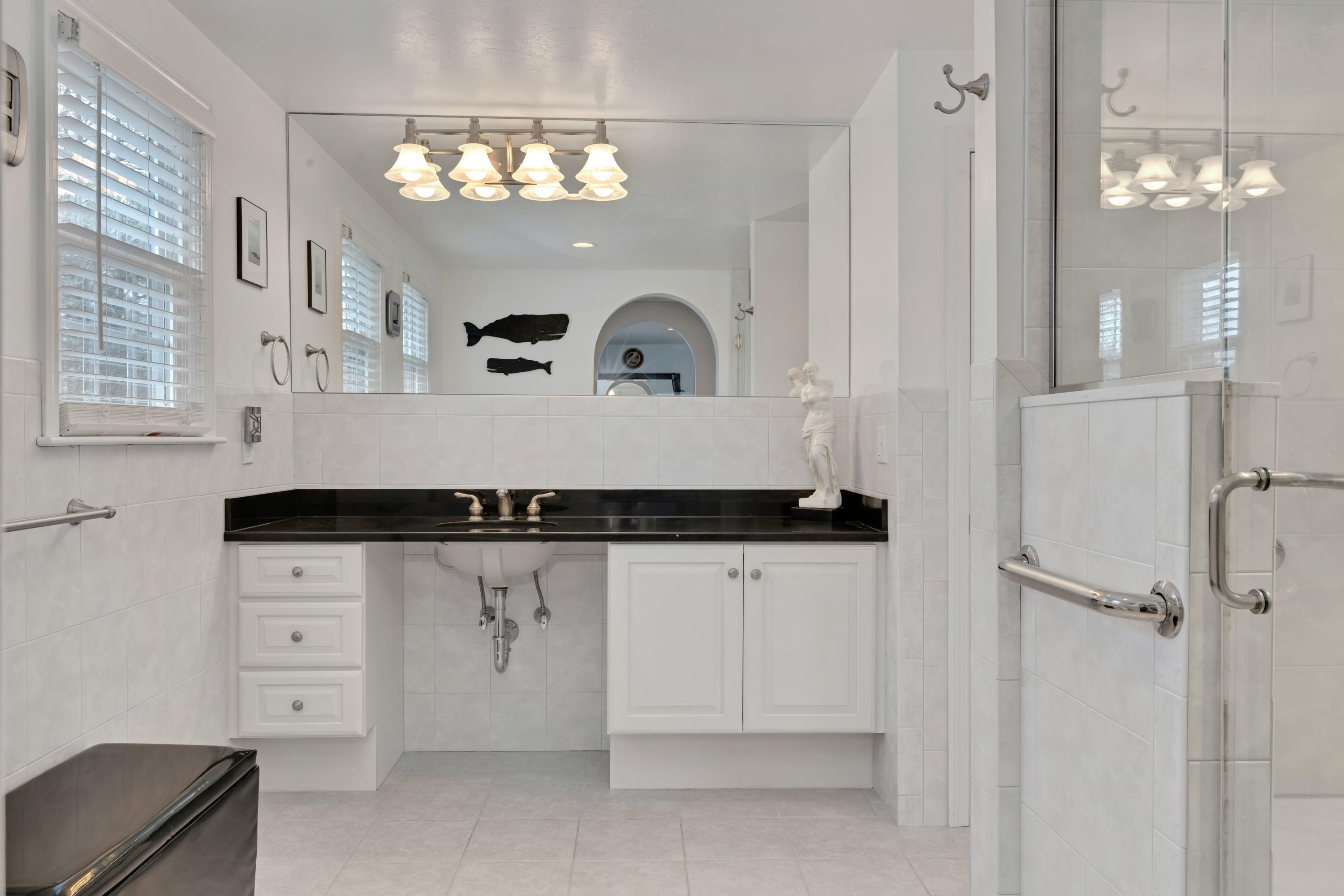 48 Square Rigger Lane Hyannis, MA 02601 - Photo 26 of 36 a bathroom with a sink bath tub and a mirror