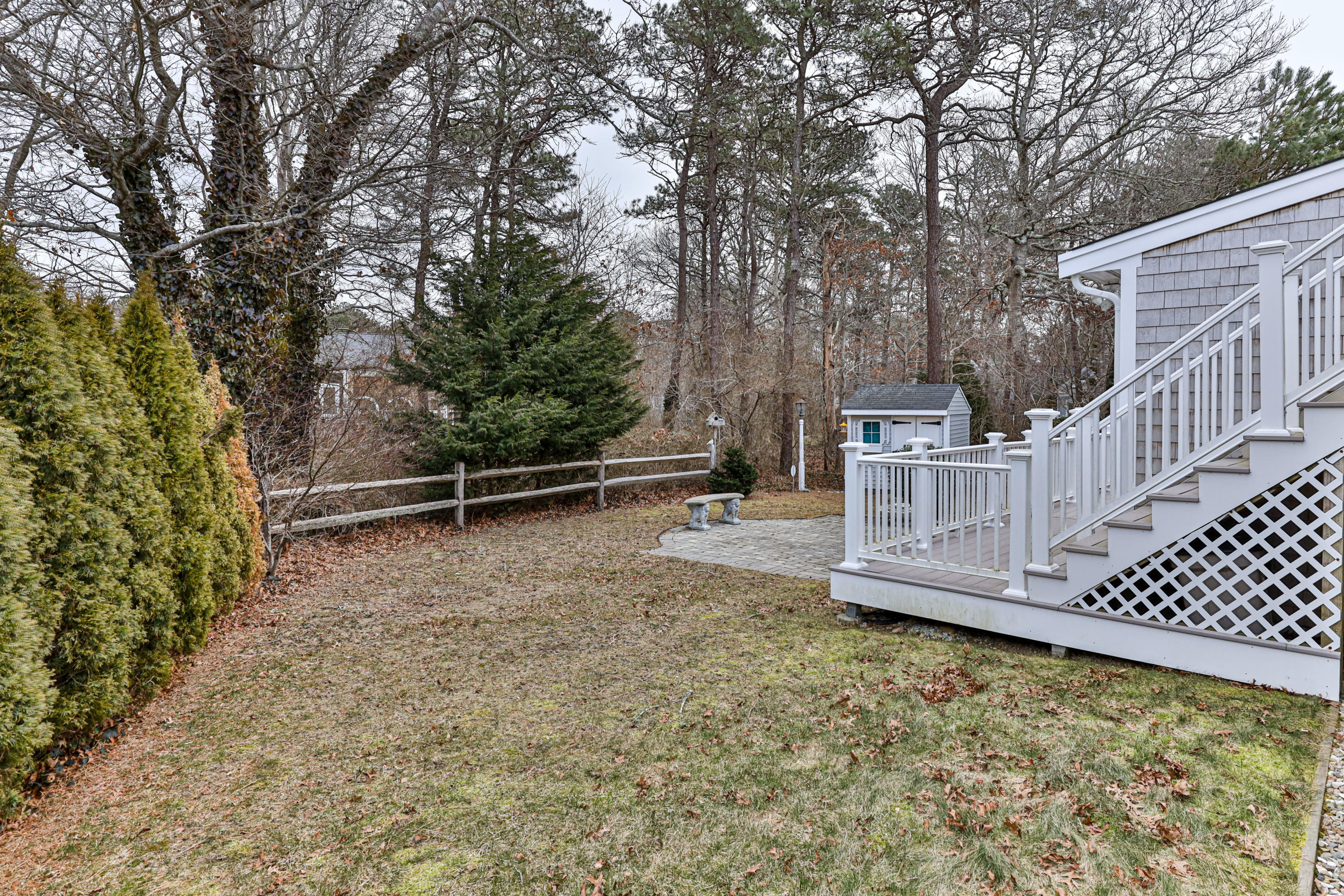 48 Square Rigger Lane Hyannis, MA 02601 - Photo 29 of 36 a view of a yard with wooden fence
