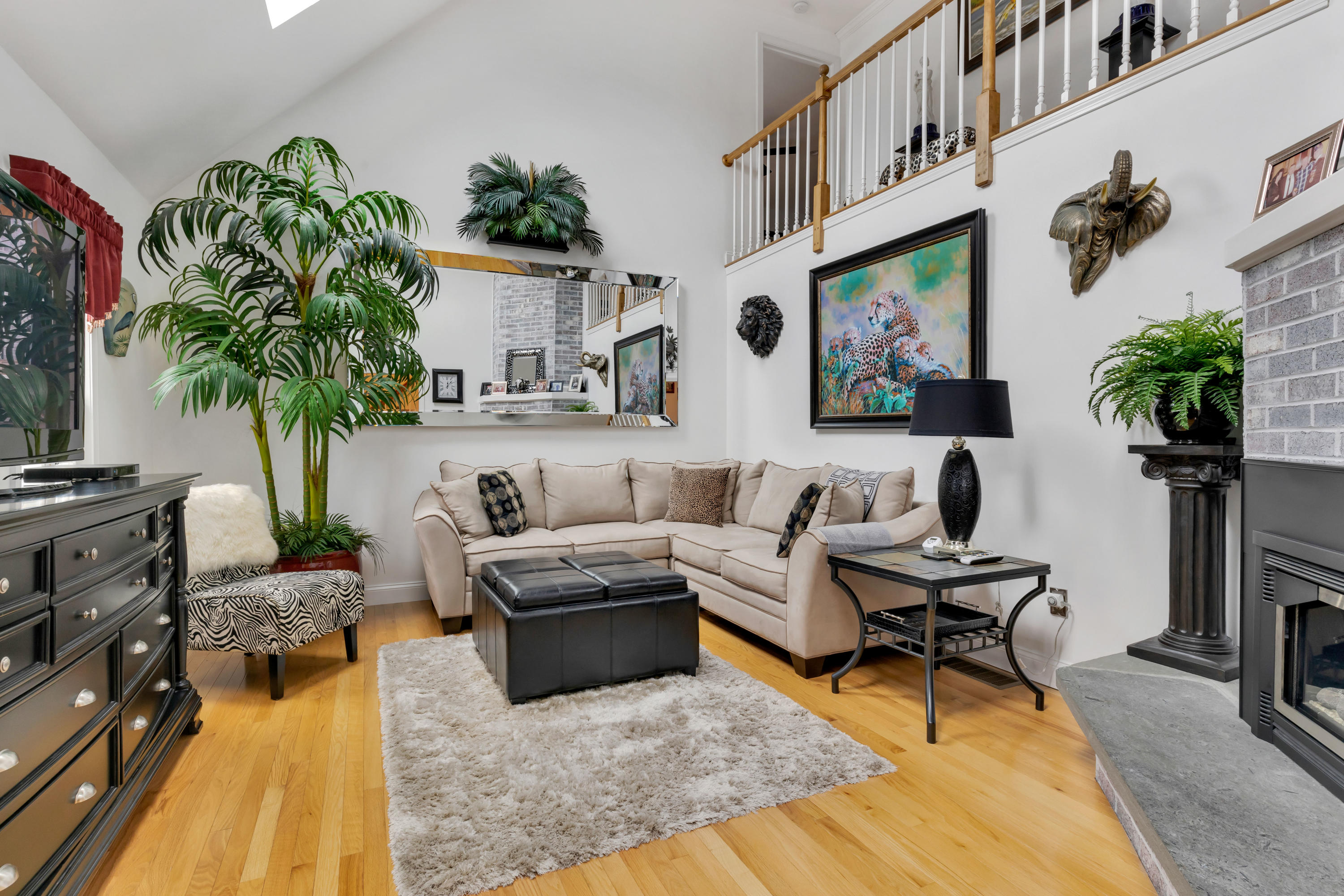 48 Square Rigger Lane Hyannis, MA 02601 - Photo 5 of 36 a living room with furniture potted plant and a table