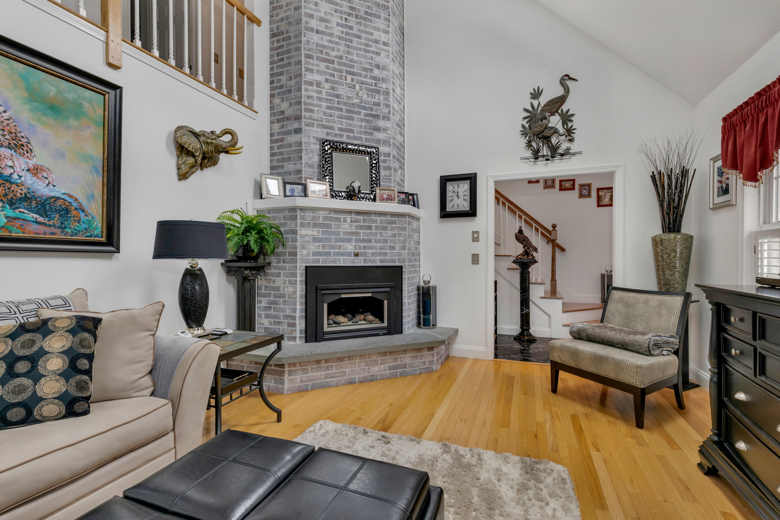 48 Square Rigger Lane Hyannis, MA 02601 - Photo 6 of 36 a living room with furniture and a fireplace