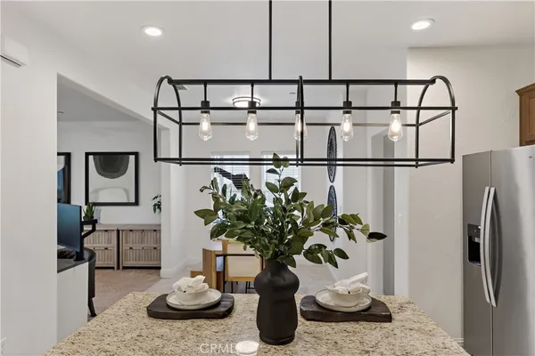 a vase of flowers sitting on a table