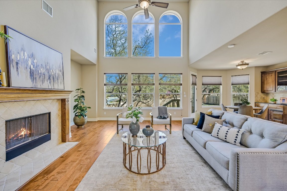 2707 Benevento Way Cedar Park, TX 78613 - Photo 1 of 1 a living room with furniture a fireplace and a large window