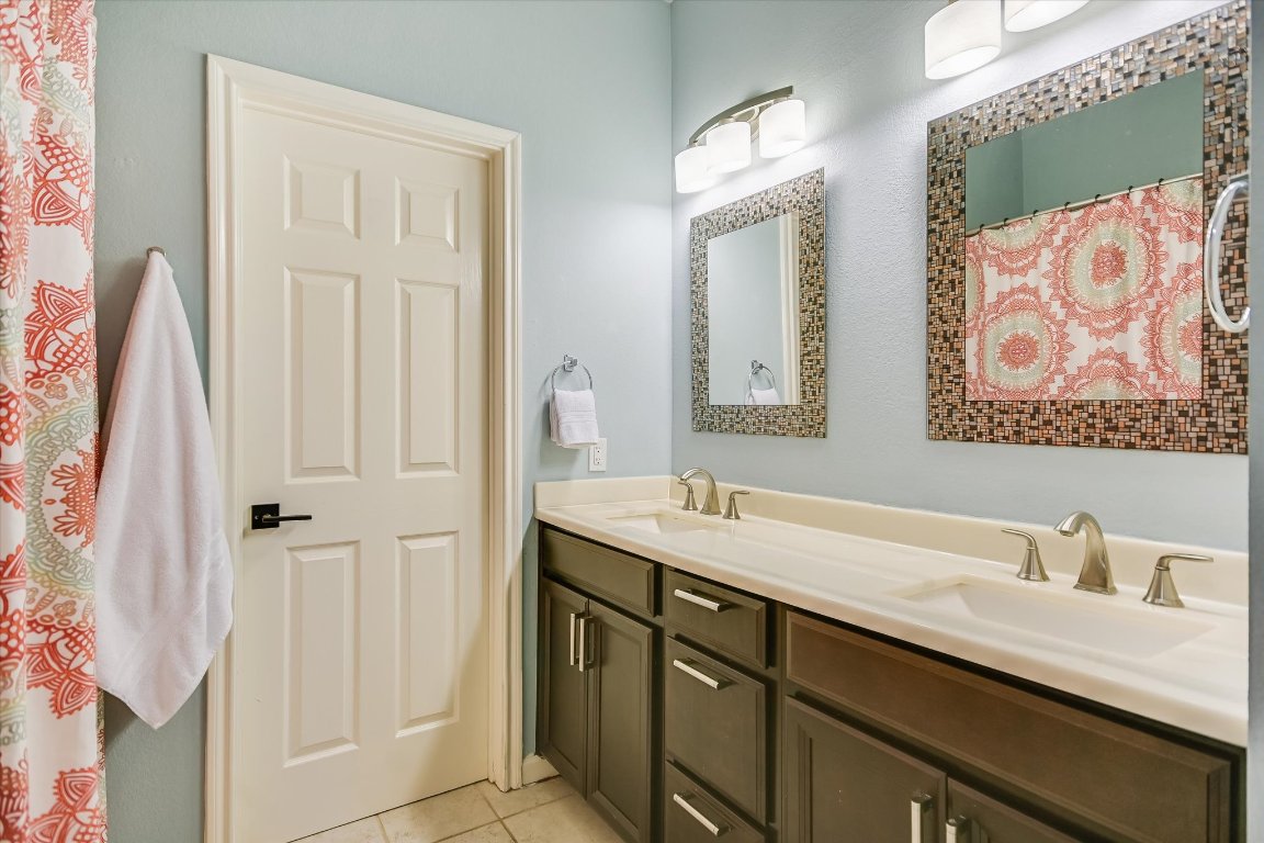 7501 Shadowridge Run, Unit 110 Austin, TX 78749 - Photo 9 of 20 The primary bath has a tub/shower combo and walk-in closet to make getting ready in the morning a breeze.