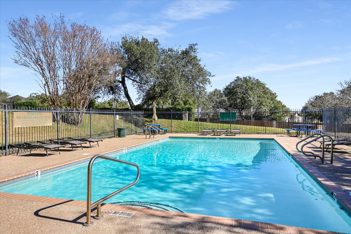 7501 Shadowridge Run, Unit 110 Austin, TX 78749 - Photo 17 of 20 Cool off in the hot Austin summers with a dip at the sparkling community pool.