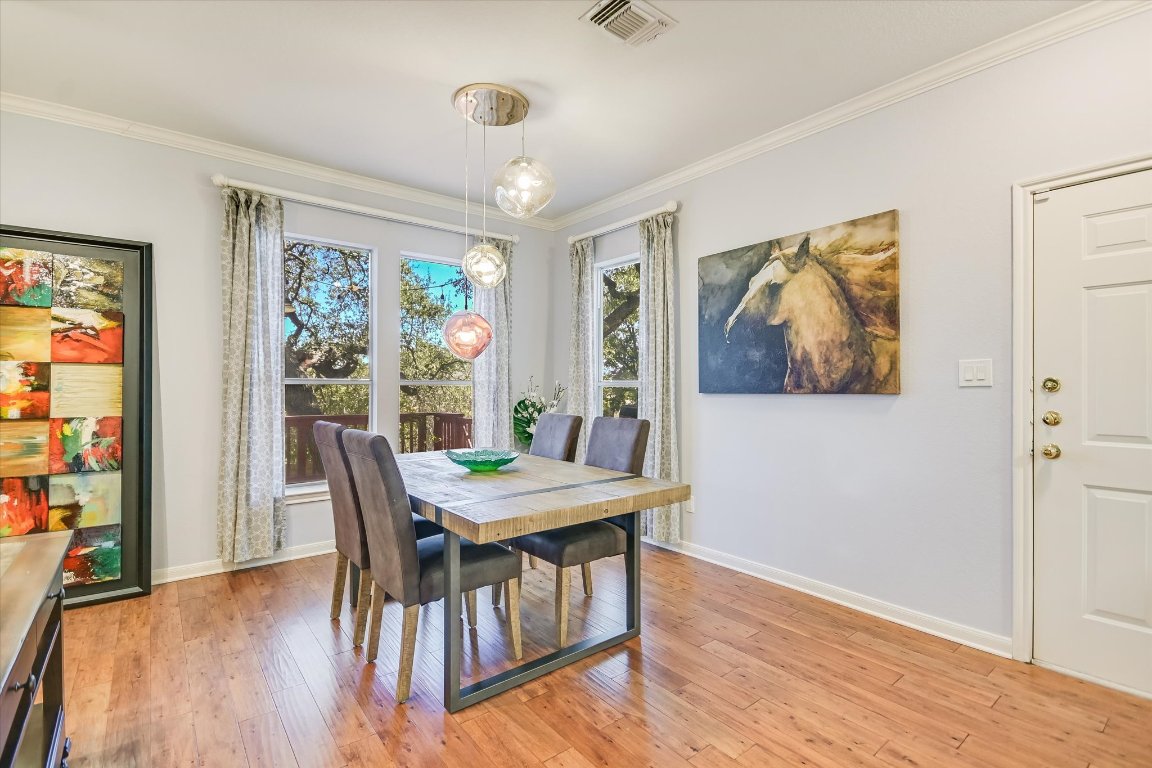 7501 Shadowridge Run, Unit 110 Austin, TX 78749 - Photo 3 of 20 The spacious, open dining room has plenty of space for entertaining guests for dinner.