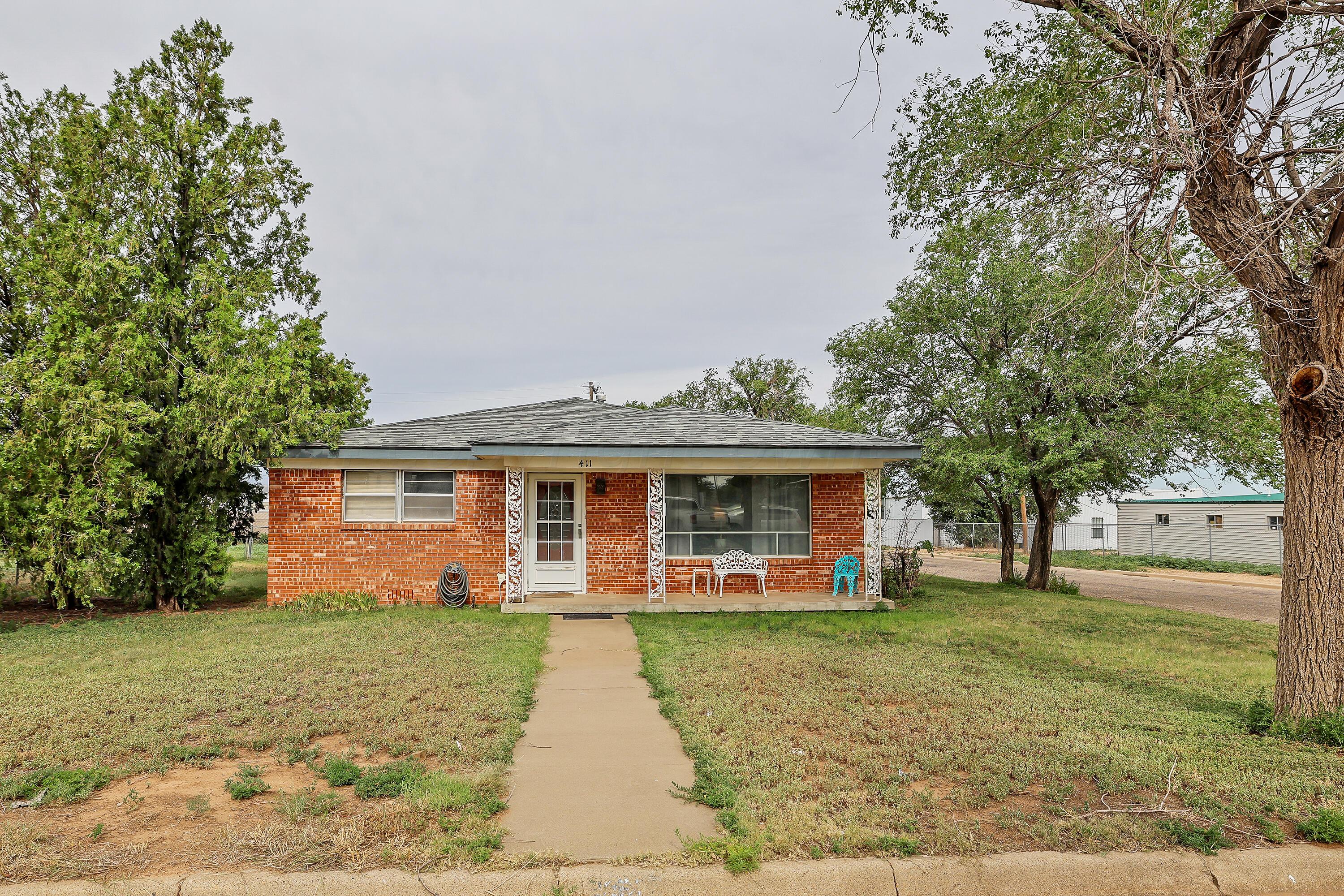411 North Prospect Street Amarillo, TX 79106 - Photo 1 of 22 front view of a house with a yard