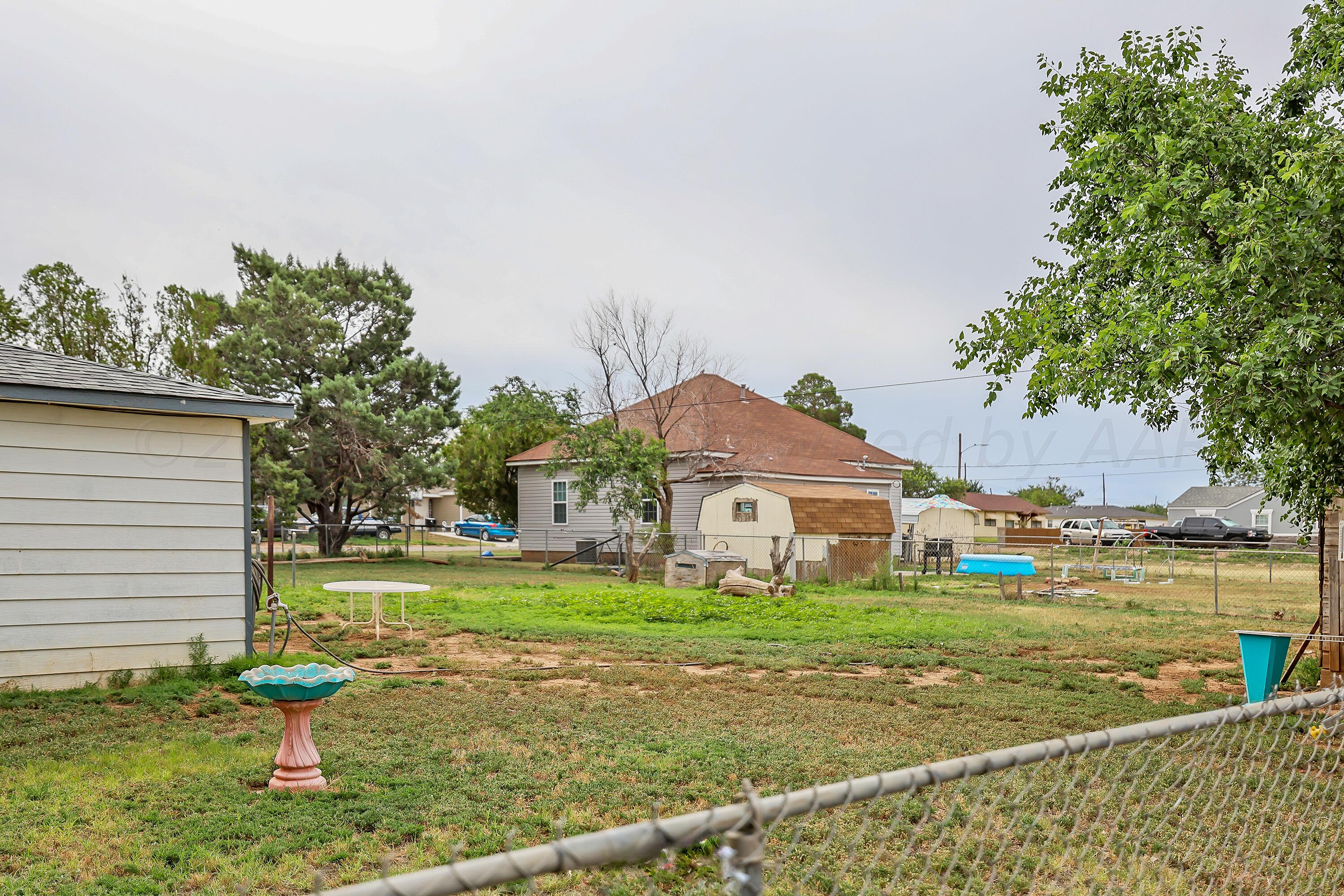 411 North Prospect Street Amarillo, TX 79106 - Photo 21 of 22 a front view of a house with garden