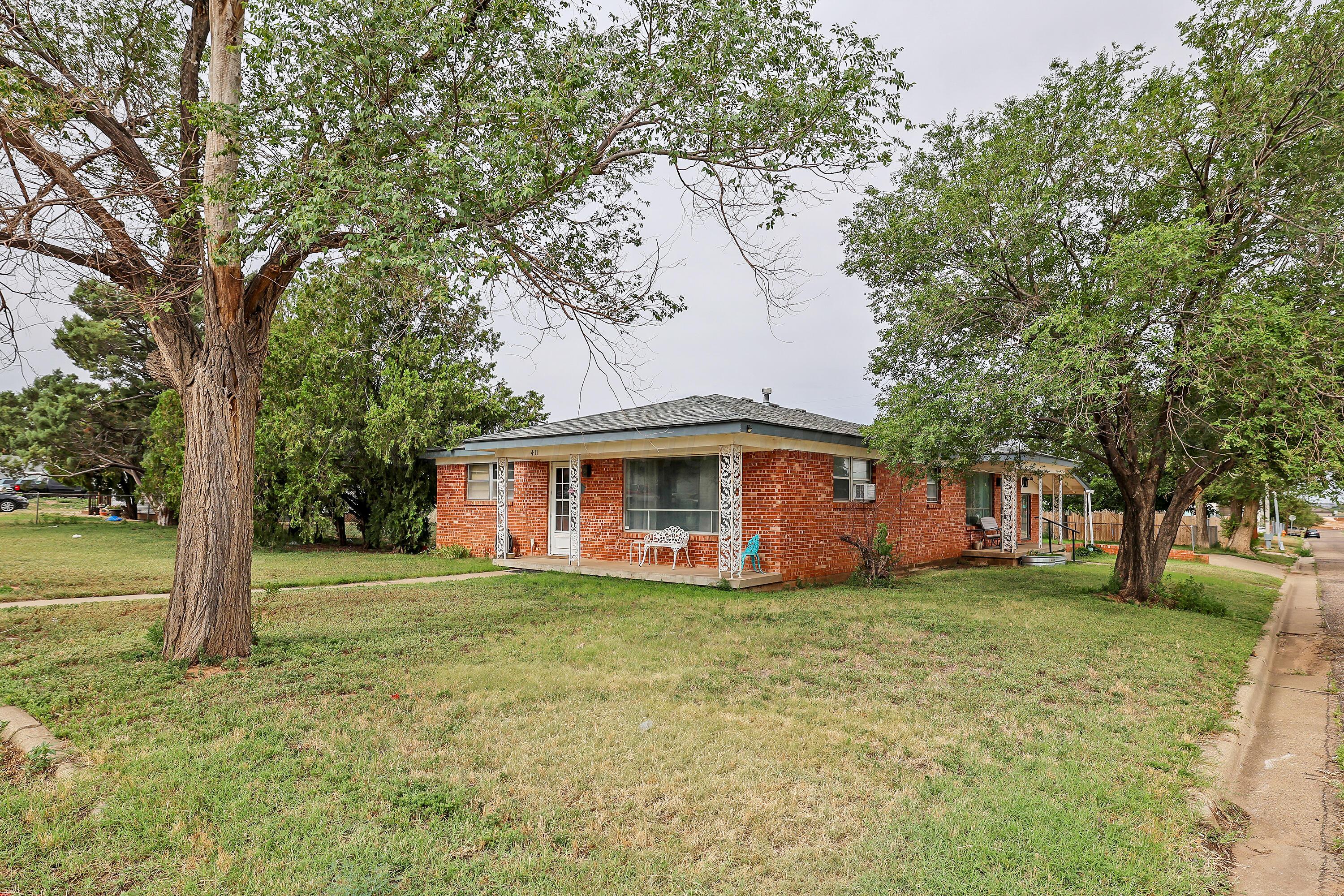 411 North Prospect Street Amarillo, TX 79106 - Photo 4 of 22 a view of a house with a yard