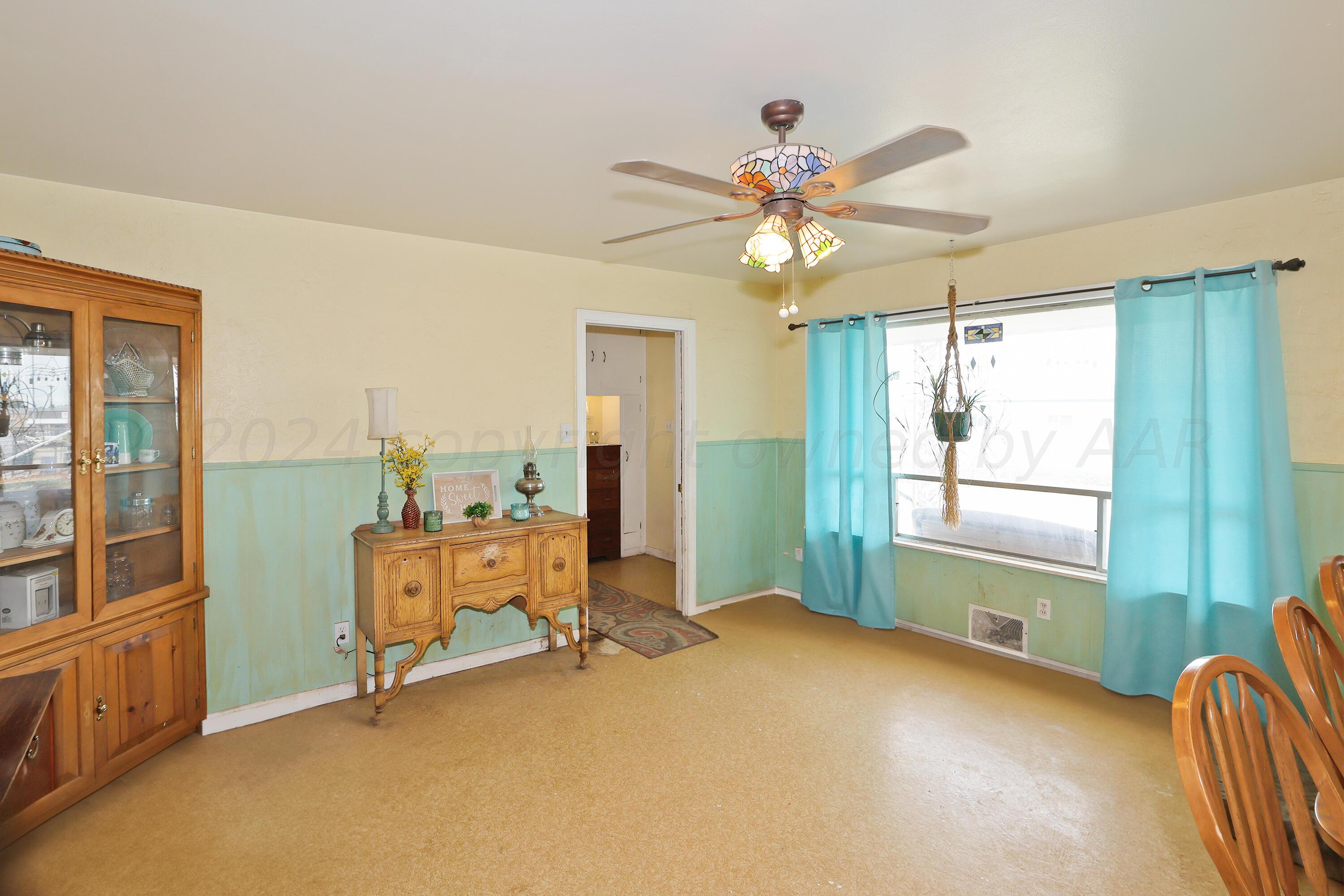 411 North Prospect Street Amarillo, TX 79106 - Photo 10 of 22 a view of an empty room with a window