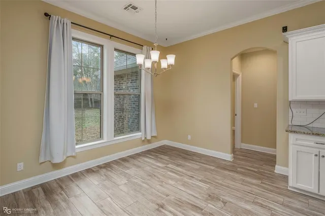 a view of livingroom with hardwood floor and window