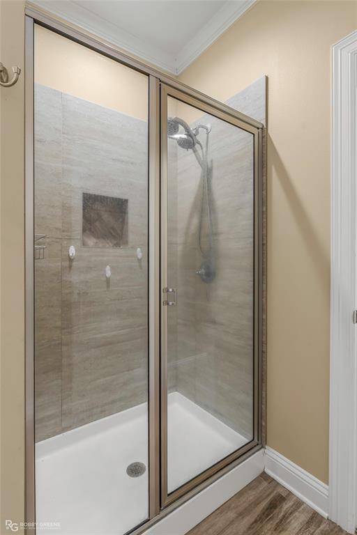 352 Wood Springs Haughton, LA 71037 - Photo 17 of 34 a bathroom with a glass shower door