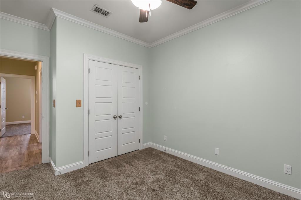 352 Wood Springs Haughton, LA 71037 - Photo 20 of 34 an empty room with a ceiling fan