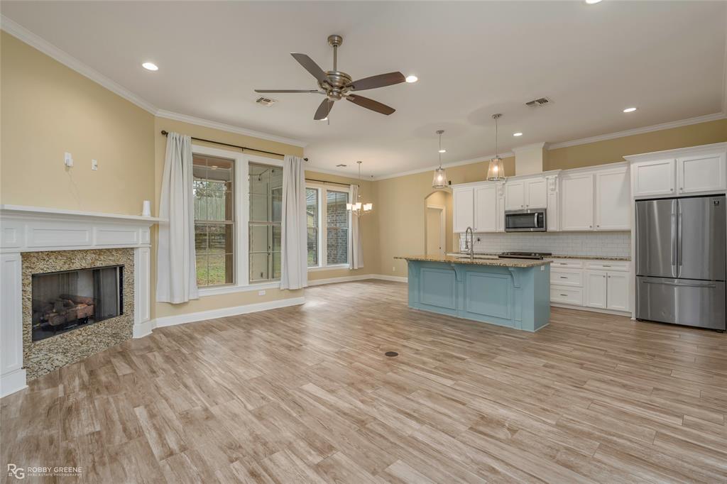 352 Wood Springs Haughton, LA 71037 - Photo 2 of 34 a view of kitchen with cabinets and wooden floor