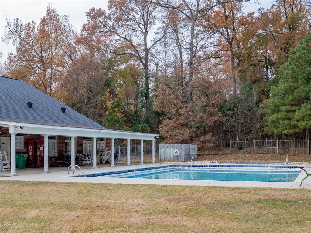 352 Wood Springs Haughton, LA 71037 - Photo 29 of 34 a view of a house with swimming pool and a yard
