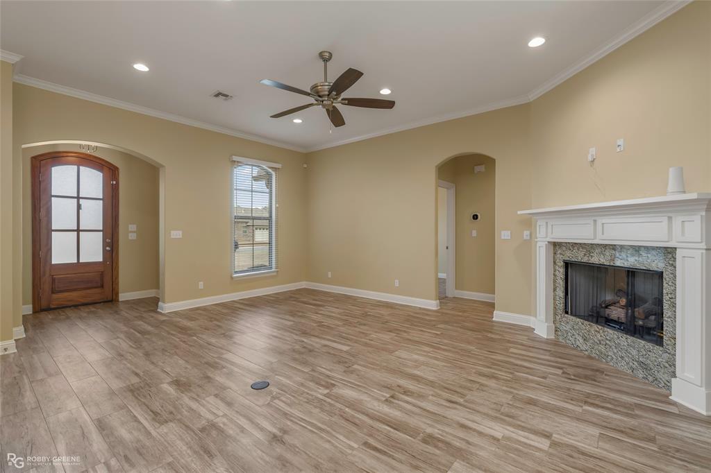 352 Wood Springs Haughton, LA 71037 - Photo 6 of 34 a view of an empty room with window and wooden floor