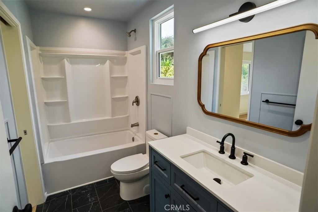 1925 Parkside Avenue Burbank, CA 91506 - Photo 20 of 30 a bathroom with a sink toilet tub and shower