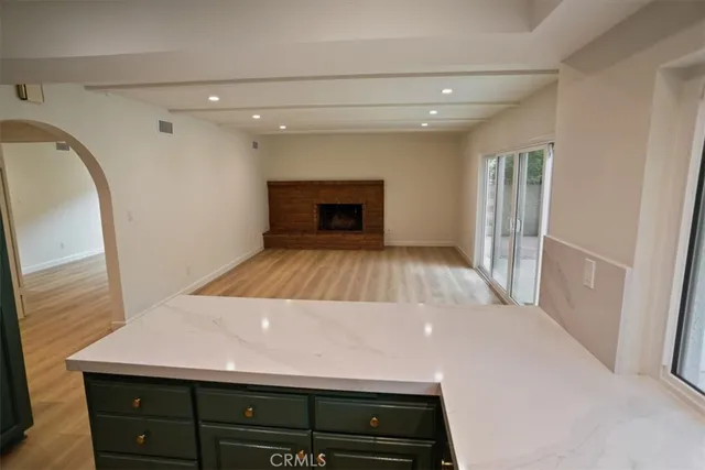 a view of a livingroom with a fireplace